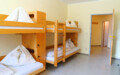 Klagenfurt Zimmer Jugendgästehaus Klagenfurt Mehrbettzimmer - © Christoph Sammer